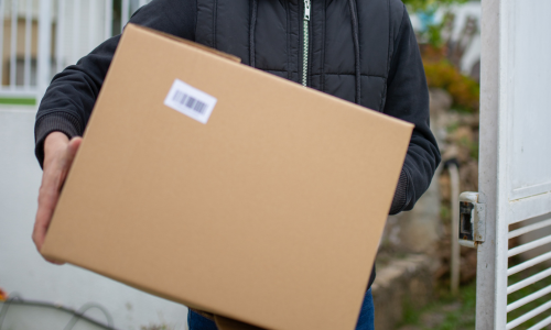 Man carrying a cardboard box